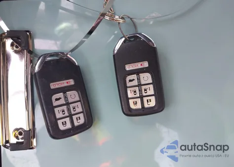 2022 Honda Odyssey Elite z USA, uszkodzony, nr VIN 5FNRL6H9XNB023640